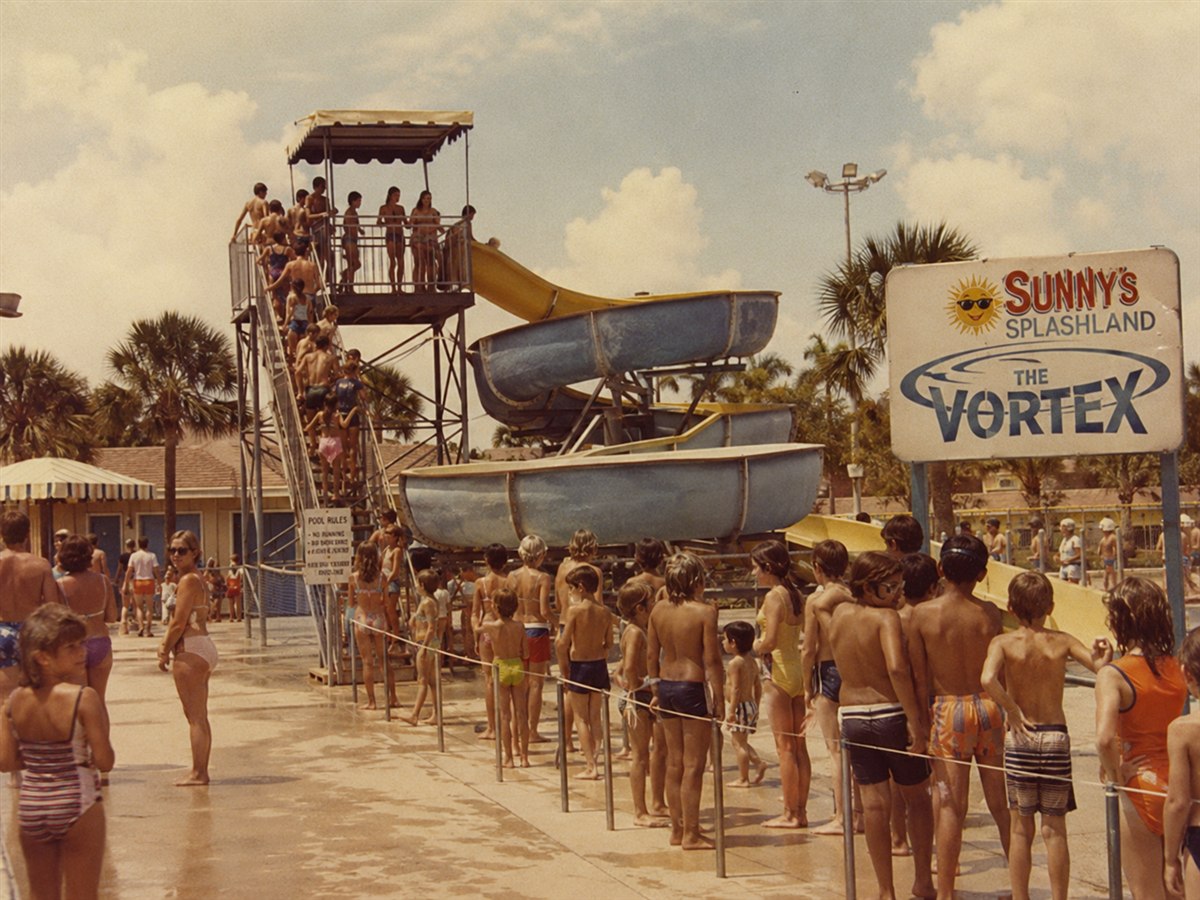 1970s film photo of the park's first big waterslide, the original Vortex